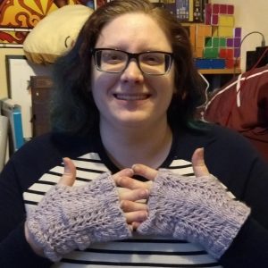 Emily wearing the Swift and Simple Lace Fingerless Mitts.