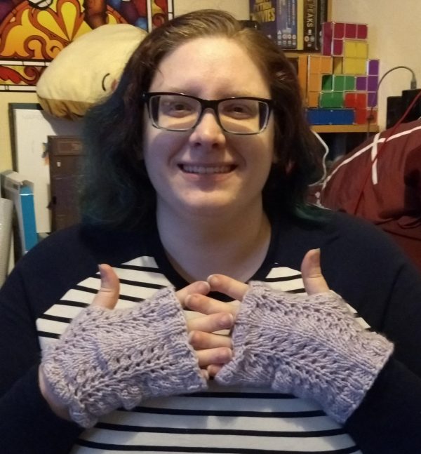 Emily wearing the Swift and Simple Lace Fingerless Mitts.